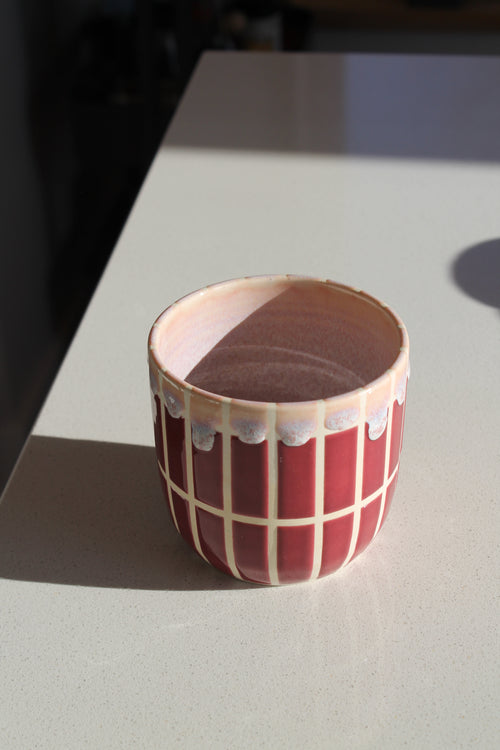 La tasse à carreaux